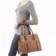 bolsa-de-verniz-em-tresse-feminina-com-detalhes-metalicos