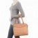 bolsa-totem-feminina-em-matelasse-detalhe-envernizado