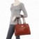 bolsa-totem-de-verniz-feminina-com-detalhes-metalicos