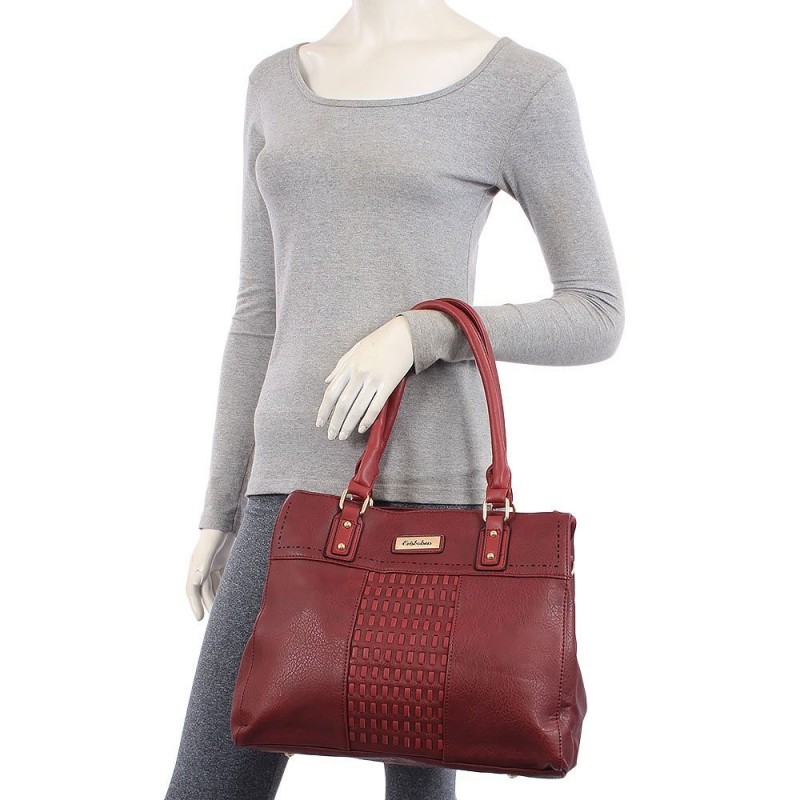 bolsa-totem-feminina-em-alto-relevo-com-vazados-e-tresse